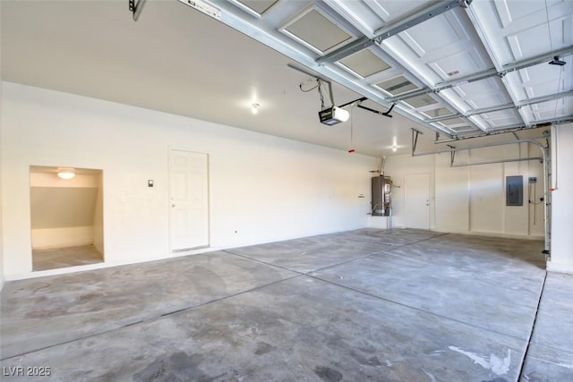 garage with electric panel, a garage door opener, and water heater