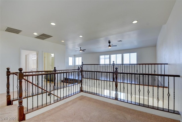 unfurnished room featuring visible vents, recessed lighting, and carpet floors