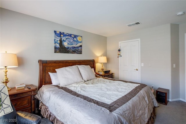 carpeted bedroom featuring visible vents and baseboards