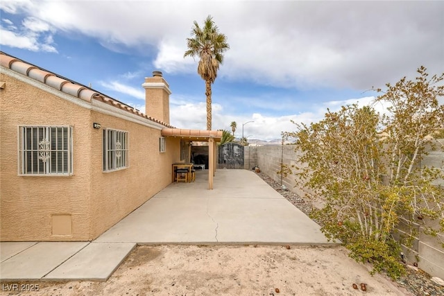 exterior space with a gate and fence