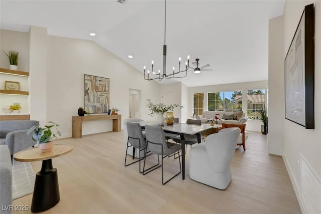 dining area with visible vents, a notable chandelier, high vaulted ceiling, recessed lighting, and light wood-style floors