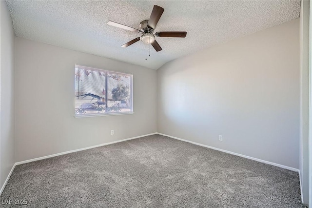 carpeted empty room with a textured ceiling, baseboards, and ceiling fan