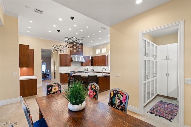 dining area featuring light tile patterned floors, visible vents, recessed lighting, and baseboards