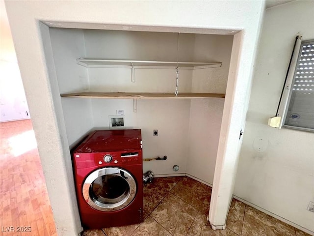 washroom featuring washer / dryer and laundry area