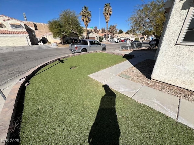 view of yard featuring a residential view