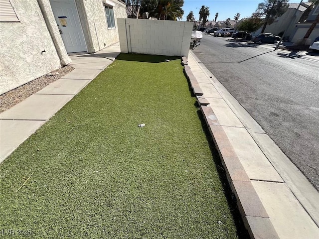 view of yard with fence