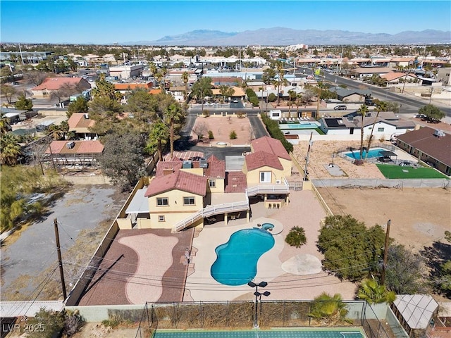 bird's eye view featuring a mountain view and a residential view