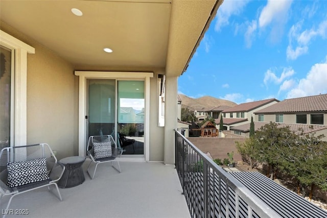 balcony featuring a residential view