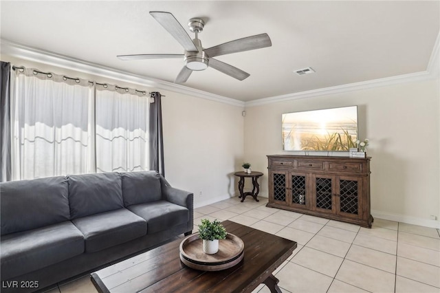 living room featuring visible vents, crown molding, baseboards, light tile patterned floors, and a ceiling fan