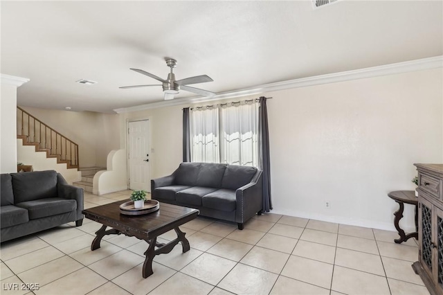 living room featuring visible vents, crown molding, stairs, light tile patterned floors, and a ceiling fan