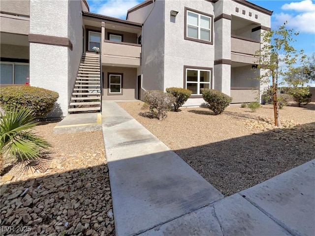 exterior space with stucco siding