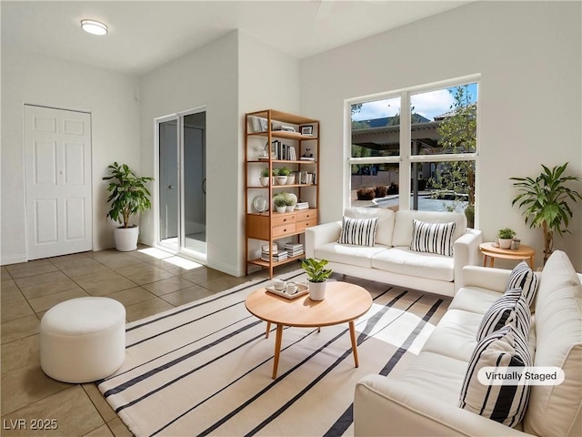 living area with tile patterned floors