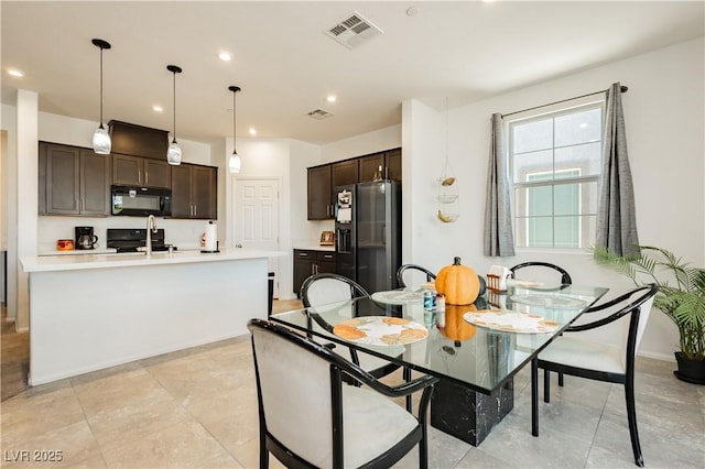 dining space with recessed lighting, visible vents, and baseboards