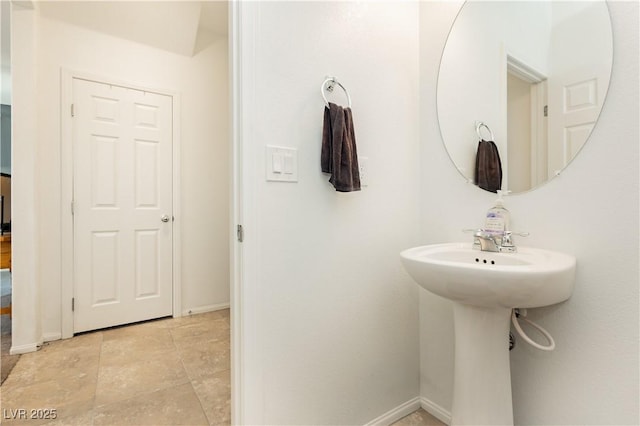 bathroom with baseboards