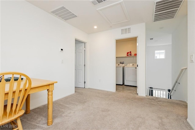 interior space featuring visible vents and washing machine and dryer