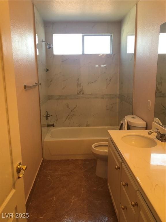 full bath featuring vanity, toilet, shower / bath combination, and a textured ceiling