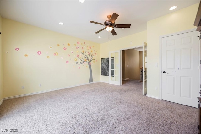 unfurnished room with baseboards, recessed lighting, ceiling fan, french doors, and light colored carpet