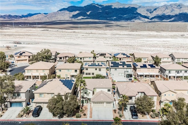 bird's eye view featuring a residential view and a mountain view