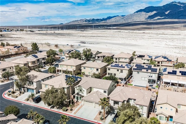 aerial view with a mountain view and a residential view