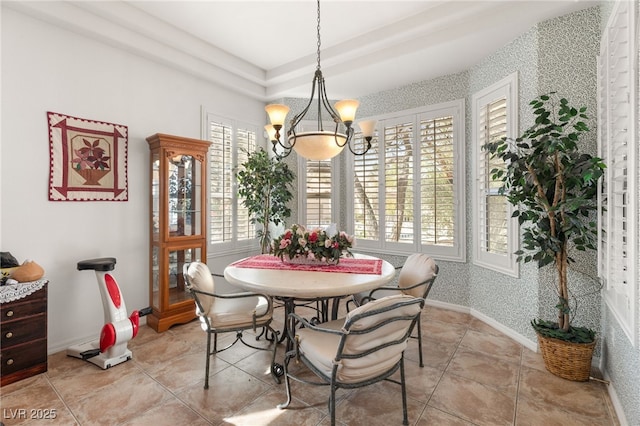 10548 Findlay Ave, Las Vegas, NV 89134 - dining area featuring a chandelier and baseboards