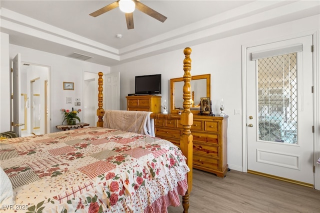 10548 Findlay Ave, Las Vegas, NV 89134 - bedroom with light wood-style flooring, a ceiling fan, baseboards, and connected bathroom