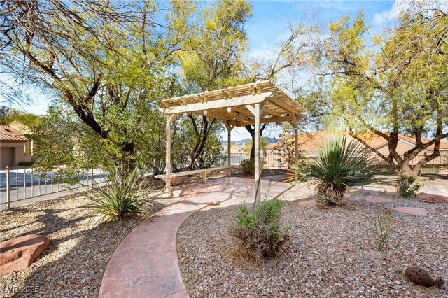 10548 Findlay Ave, Las Vegas, NV 89134 - view of yard with a pergola, fence, and a patio area