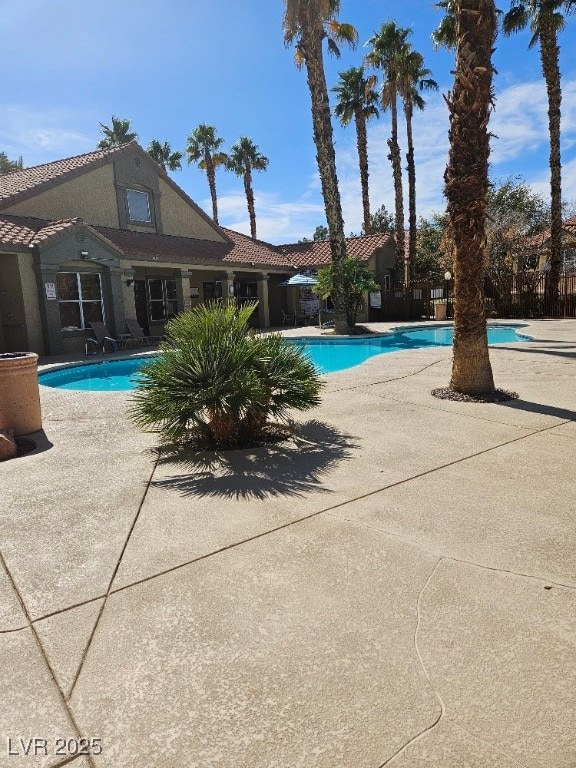 pool with a patio