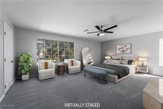 carpeted bedroom featuring visible vents, baseboards, and ceiling fan