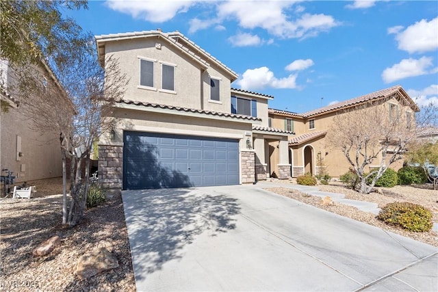 mediterranean / spanish house with a garage, stone siding, driveway, and stucco siding