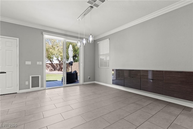 interior space with visible vents, baseboards, and crown molding