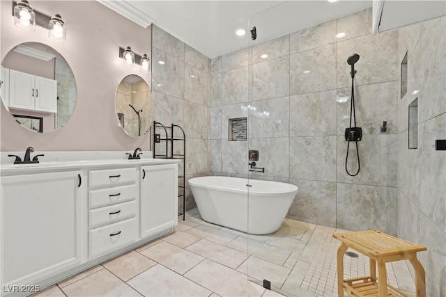 bathroom with a freestanding tub, a walk in shower, a sink, tile patterned flooring, and double vanity