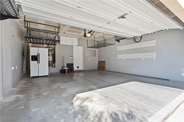 garage with electric water heater and white fridge with ice dispenser