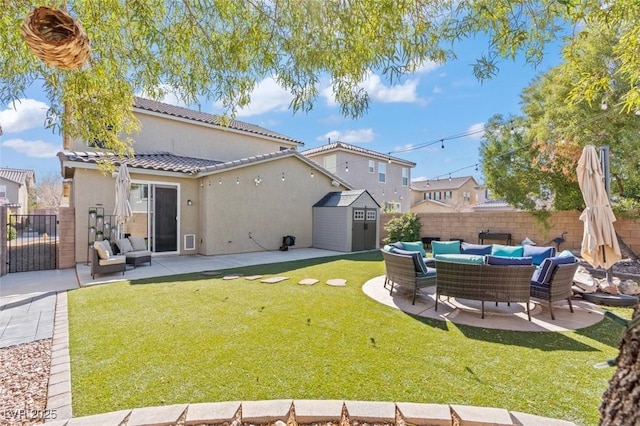 back of house featuring a storage shed, a fenced backyard, outdoor lounge area, and an outdoor structure