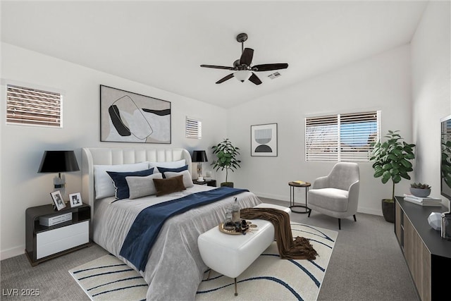 bedroom featuring lofted ceiling, light colored carpet, and baseboards