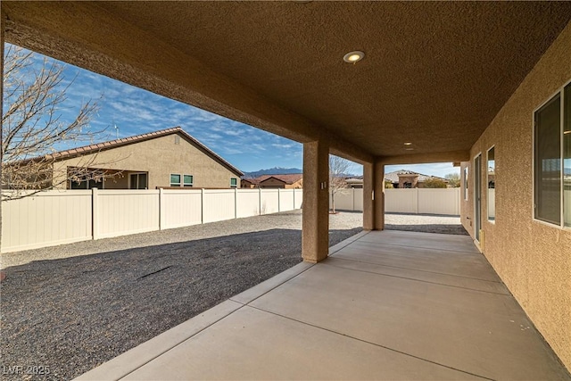 view of patio featuring a fenced backyard