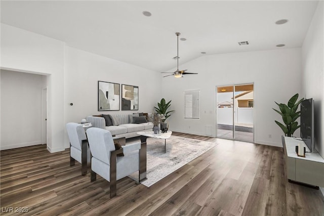 living room with wood finished floors, baseboards, visible vents, ceiling fan, and vaulted ceiling