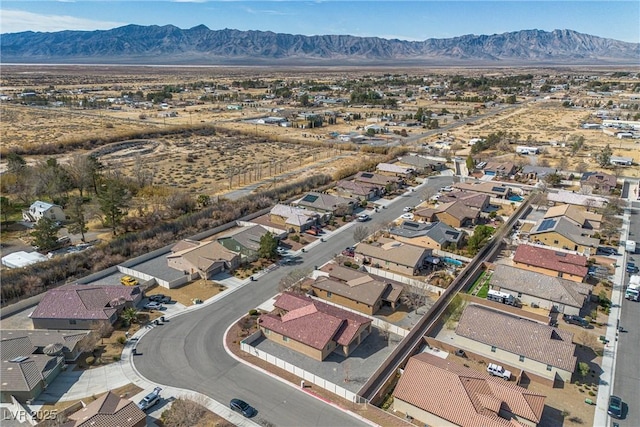 drone / aerial view with a mountain view and a residential view