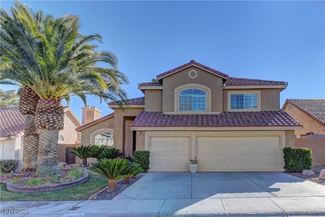 mediterranean / spanish home featuring concrete driveway, a tile roof, stucco siding, a chimney, and a garage