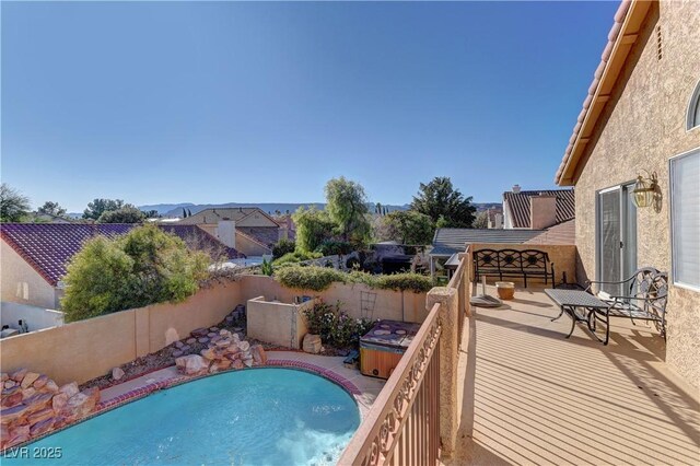 view of pool featuring a fenced in pool and a fenced backyard