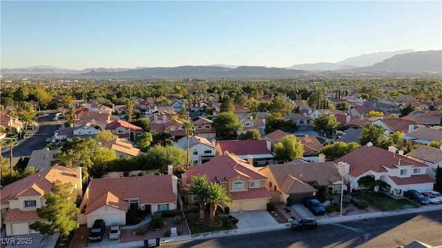 aerial view featuring a mountain view and a residential view