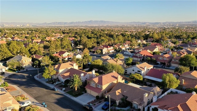 drone / aerial view with a mountain view and a residential view