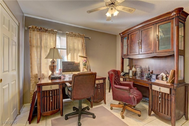 office with light tile patterned floors and a ceiling fan