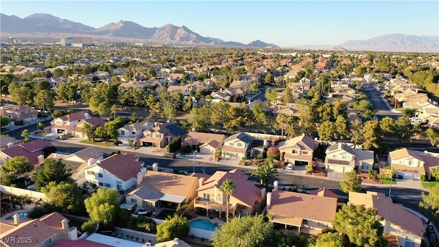 drone / aerial view featuring a mountain view and a residential view