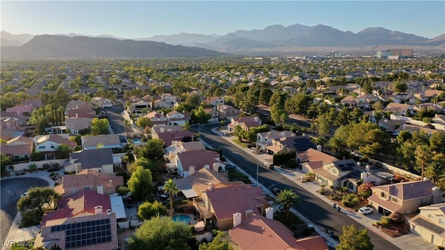 bird's eye view with a residential view and a mountain view