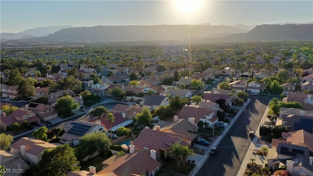 drone / aerial view with a mountain view and a residential view