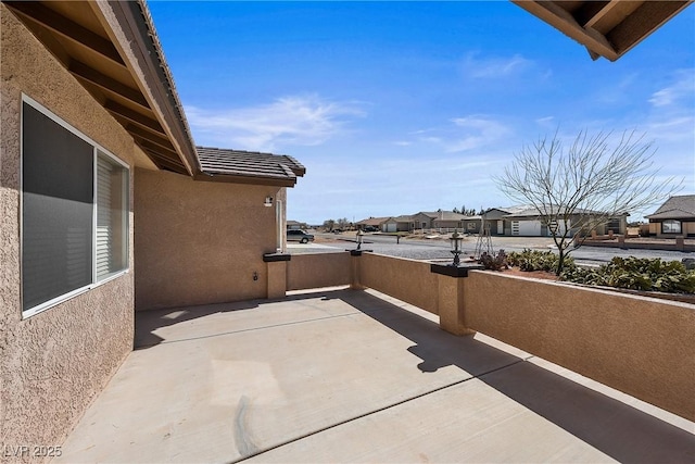 view of patio / terrace featuring a residential view