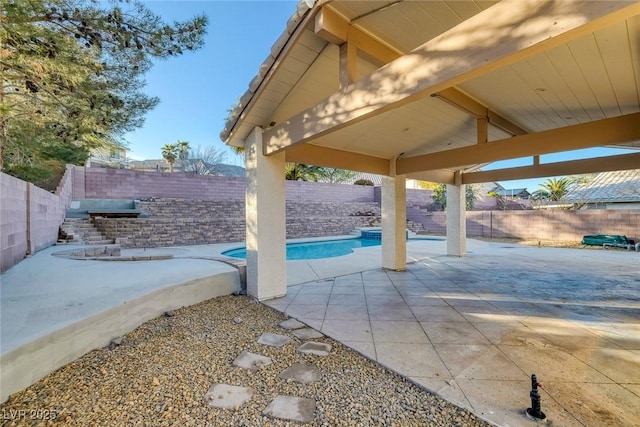 view of patio / terrace featuring a fenced in pool and a fenced backyard