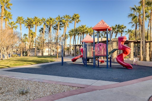 community play area with a lawn