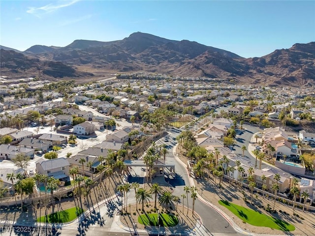 birds eye view of property with a residential view and a mountain view