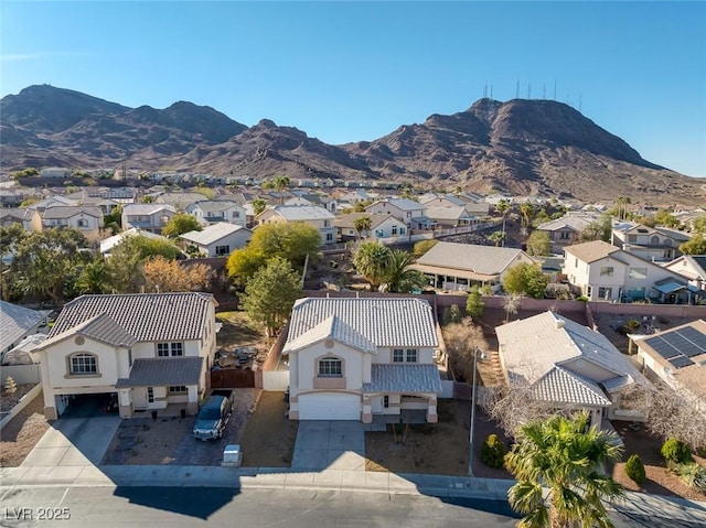 bird's eye view featuring a mountain view and a residential view